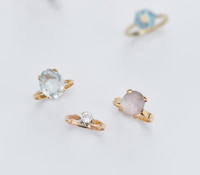 TROIS BAGUES en or (750) ornées de pierres...