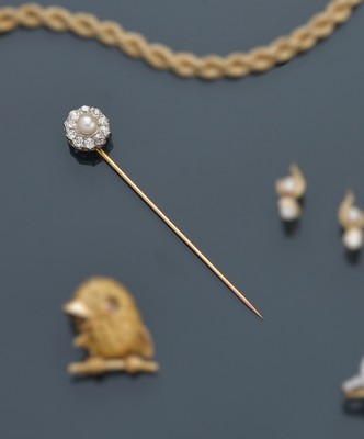 ÉPINGLE A CRAVATE en or (750) avec bouquet...