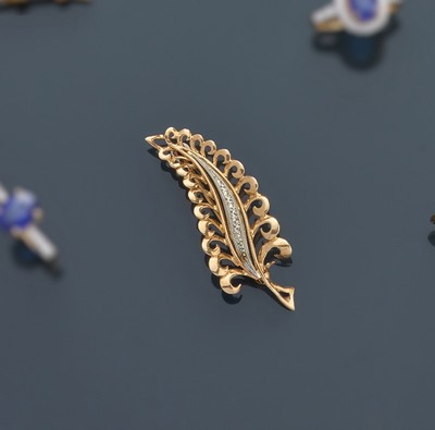 BROCHE feuille deux tons d'or (750).