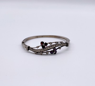 BRACELET articulé en argent (900) à décor...