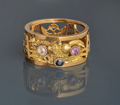 BRACELET manchette en or (750) à décor ajouré...