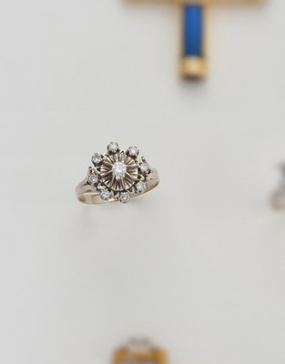 BAGUE marguerite en or gris (750) sertie...