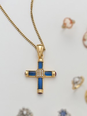 PENDENTIF croix en or (750), serti de pierres...