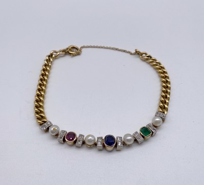 BRACELET en or (750) à mailles gourmettes...