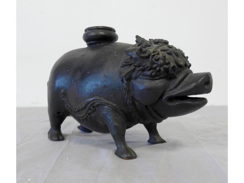 COCHON en bronze patiné formant bougeoir
