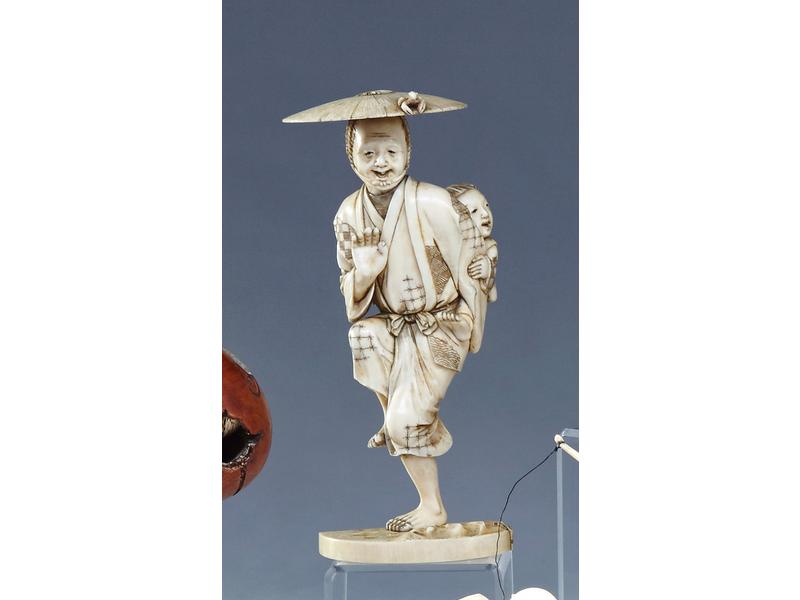 OKIMONO en ivoire sculpté représentant un...