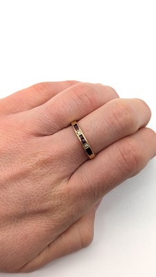 DEMI-ANNEAU en or (750) avec rubis calibrés...