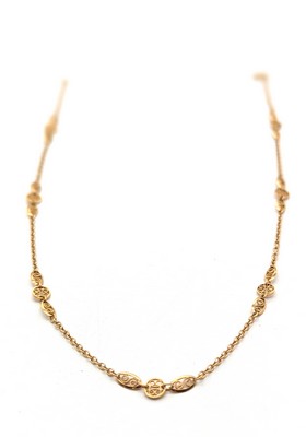 CHAÎNE en or (750) à motifs en filigrane...