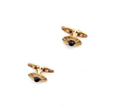 PAIRE DE BOUTONS DE MANCHETTE en or jaune...