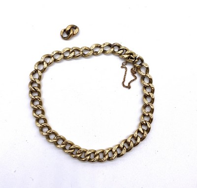 CHAÎNE et sa chaînette de sécurité en or...