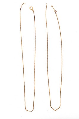 DEUX COLLIERS en or (750) à double maille...