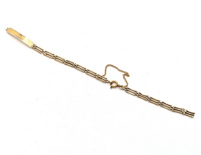 GOURMETTE en or (750) deux tons gravée "Bertrand...