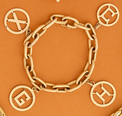 BRACELET en or (750) en maille forçat orné...