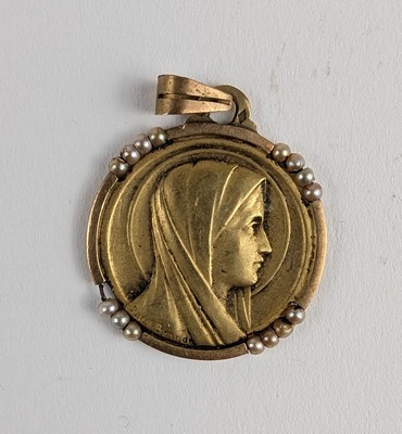 MÉDAILLE en or (750) à profil de Vierge