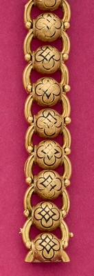 BRACELET articulé en or (750) à maillons...