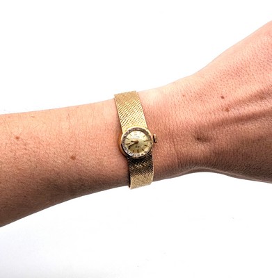 MONTRE bracelet de dame tout or (750), à...