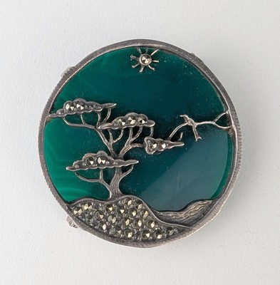 BROCHE ronde en argent (925) ornée d’une...