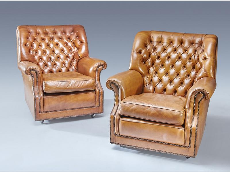 PAIRE DE FAUTEUILS "confortables" en cuir...