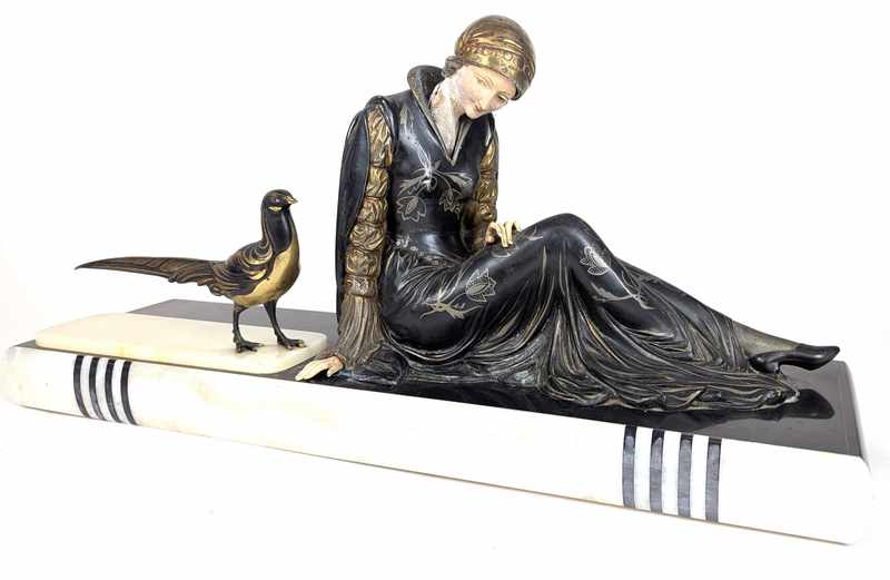 GARNITURE DE CHEMINÉE en régule et celluloïde...