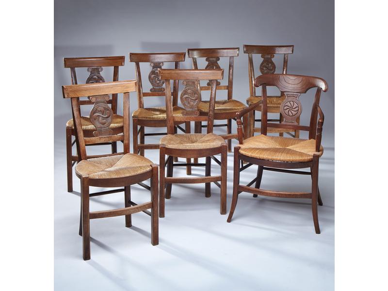 FAUTEUIL ET SUITE DE SIX CHAISES paillées...