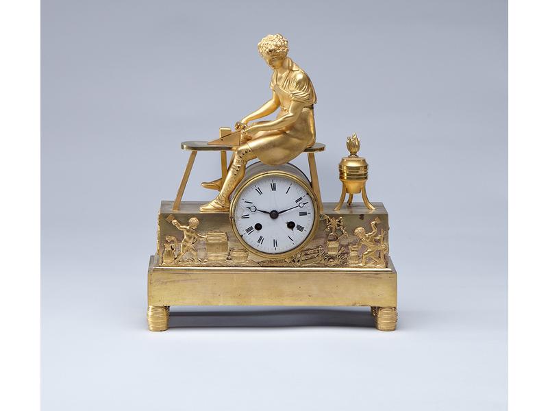 PENDULE dite au TONNELIER, en bronze doré...