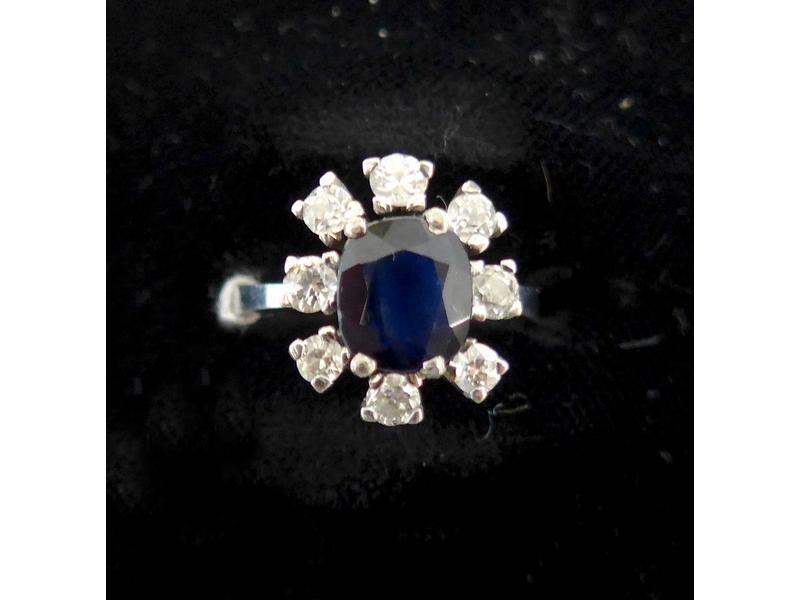 BAGUE MARGUERITE en or gris (750) ornée d'un...