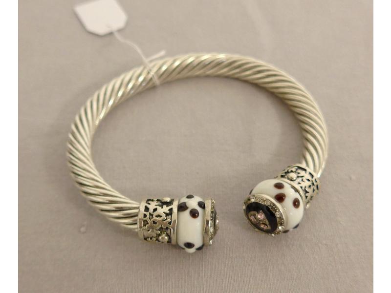 BRACELET rigide en métal tourné et boules...