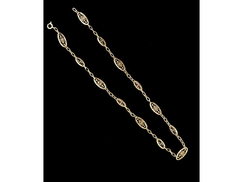 COLLIER en or jaune 18K (750) à maillons...