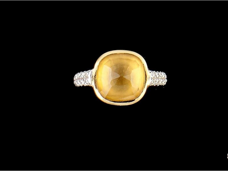 BAGUE en or jaune et or gris 18K (750) ornée...