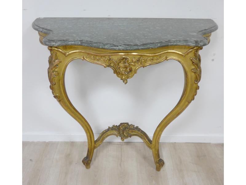 CONSOLE en bois mouluré, sculpté et doré,...