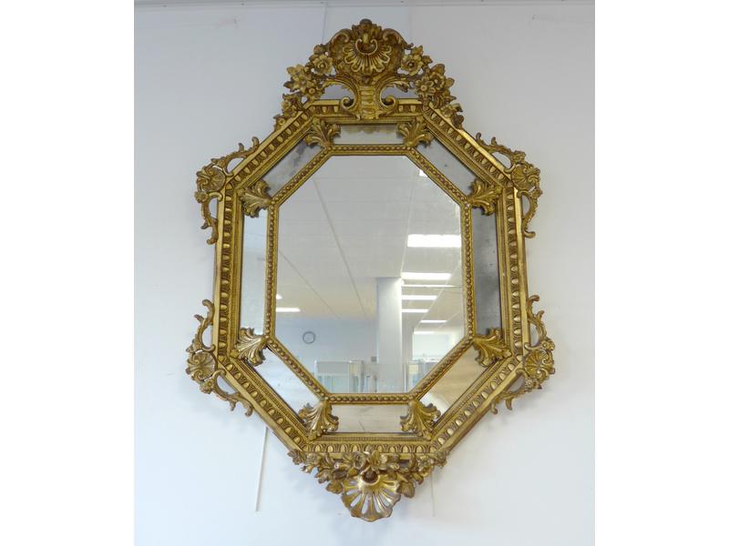 MIROIR octogonal à parecloses dans un cadre...