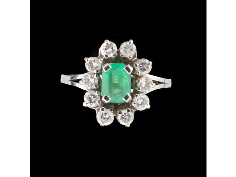 BAGUE marguerite en or blanc (750) et platine...