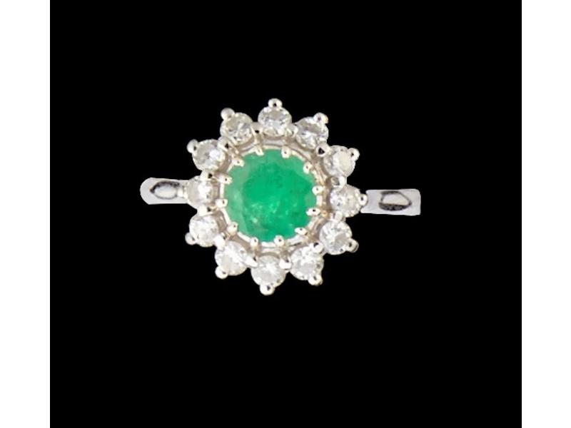 BAGUE marguerite en or blanc (750) ornée...