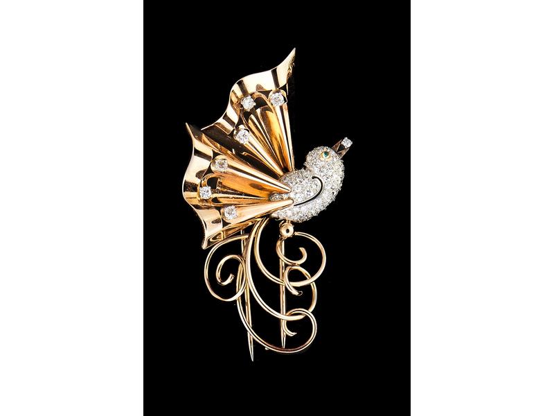 BROCHE en or jaune (750) et platine, figurant...
