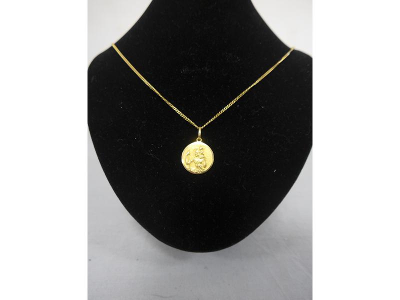 CHAÎNE en or jaune (750) et SA MEDAILLE de...