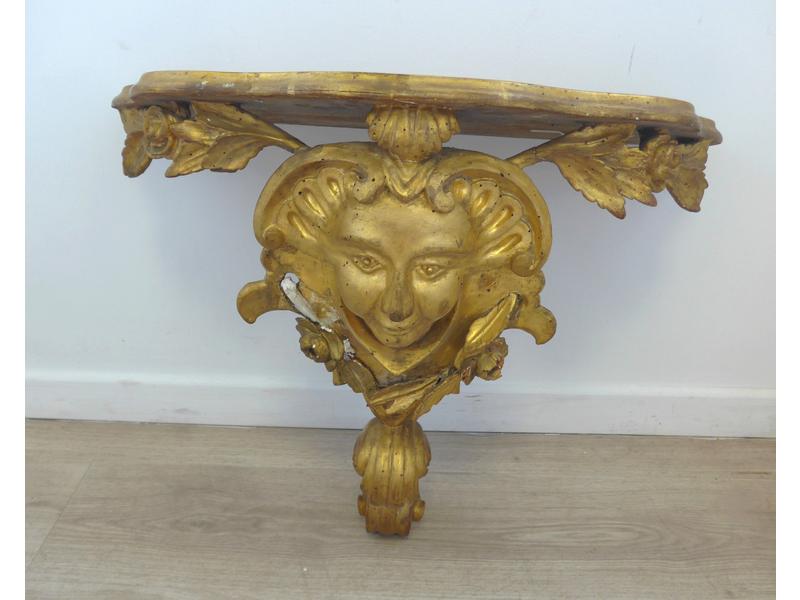 CONSOLE D'APPLIQUE en bois sculpté et doré...