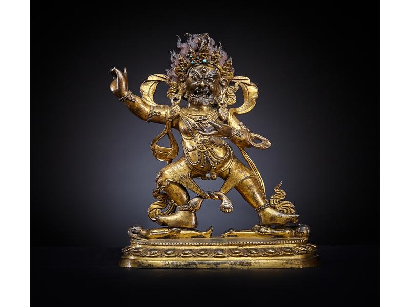 STATUETTE en bronze doré représentant le...