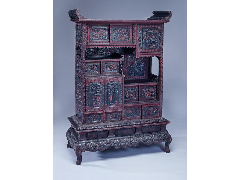 CABINET en bois laqué rouge et noir dans...