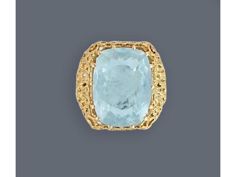 BAGUE en or jaune (750) ornée d'une aigue-marine...