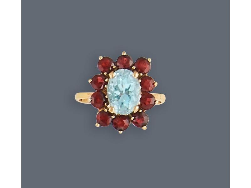 BAGUE type marguerite en or jaune (750) sertie...