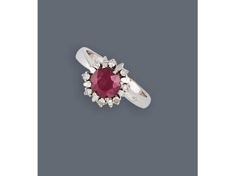 BAGUE marguerite en or gris (750) sertie...