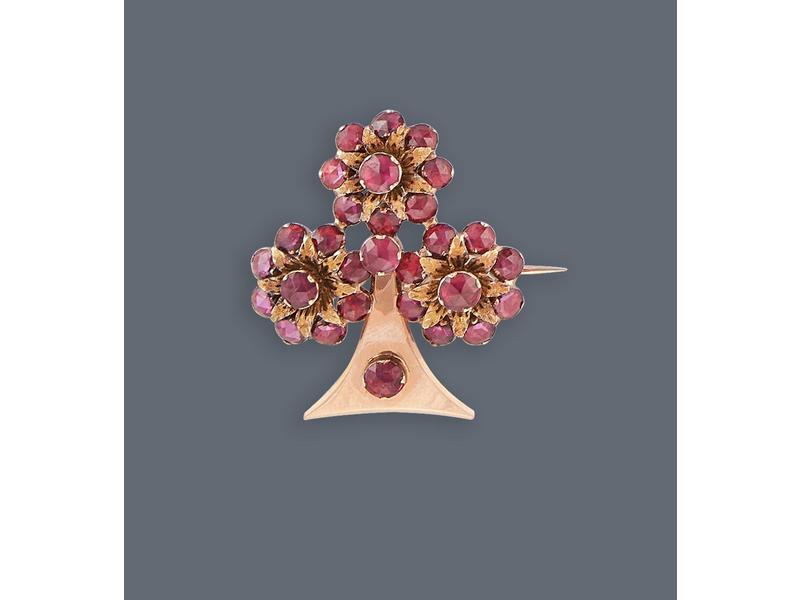 BROCHE en or rose (750) en forme de trèfle...
