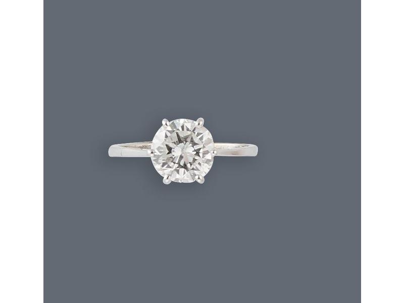 SOLITAIRE en or blanc (750) orné d'un diamant...