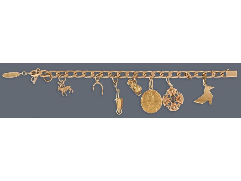 BRACELET en or jaune (750) maille gourmette...