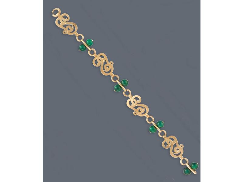 BRACELET en or jaune (750) à maillons alternés...