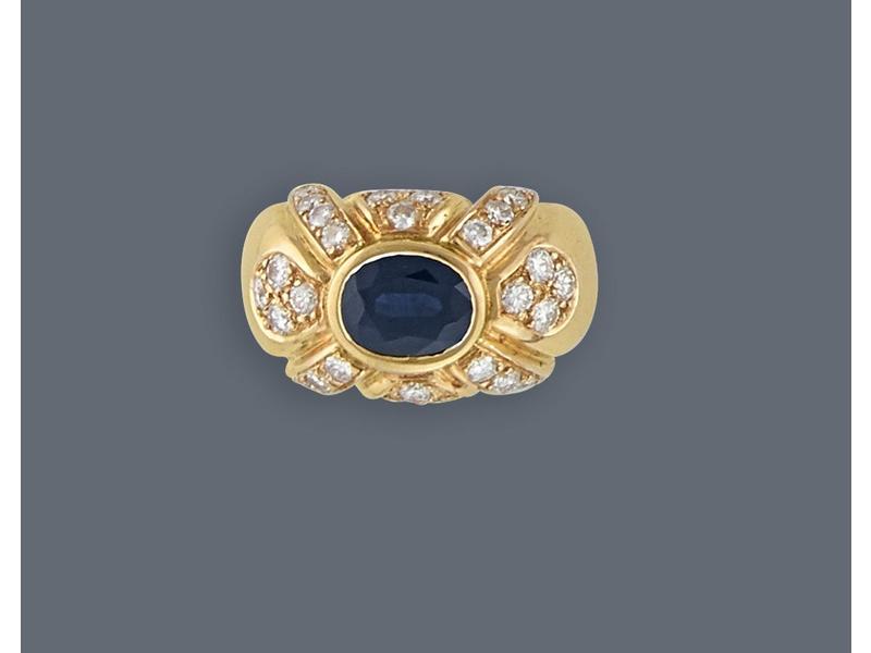 BAGUE en or jaune (750) ornée d'un saphir...