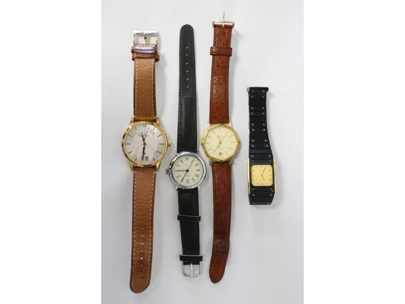 QUATRE MONTRES bracelets d'homme:
