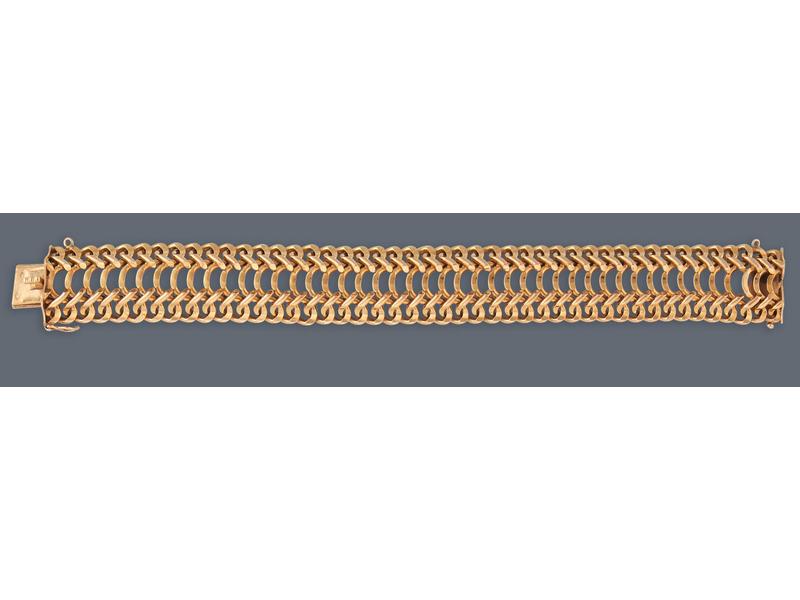 BRACELET en or jaune (750) à mailles torsadées...
