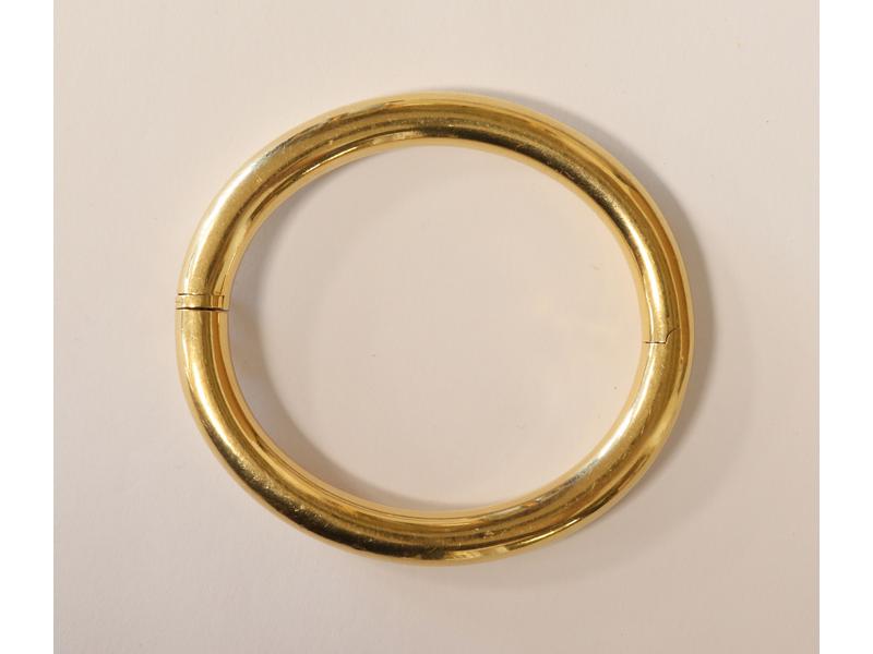 BRACELET jonc articulé en or jaune (750)...