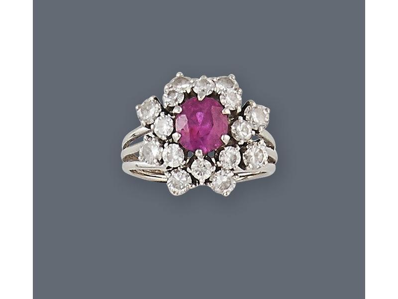 BAGUE type marguerite en or gris (750) et...